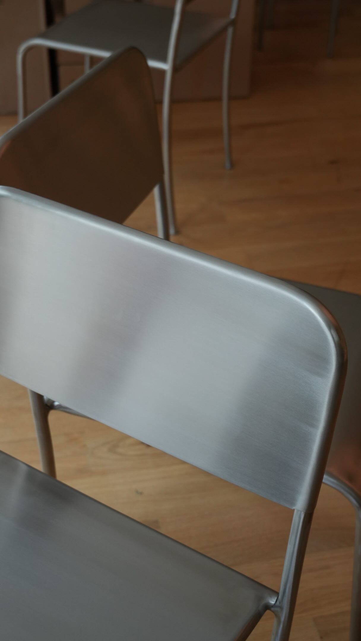 Brushed-metal stool — interior detail